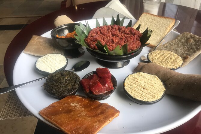 Go wheretheLocalsgo, Eatwhat thelocalseat!open Market&More Tours - The Lion of Judah and Addis Ababa City Views